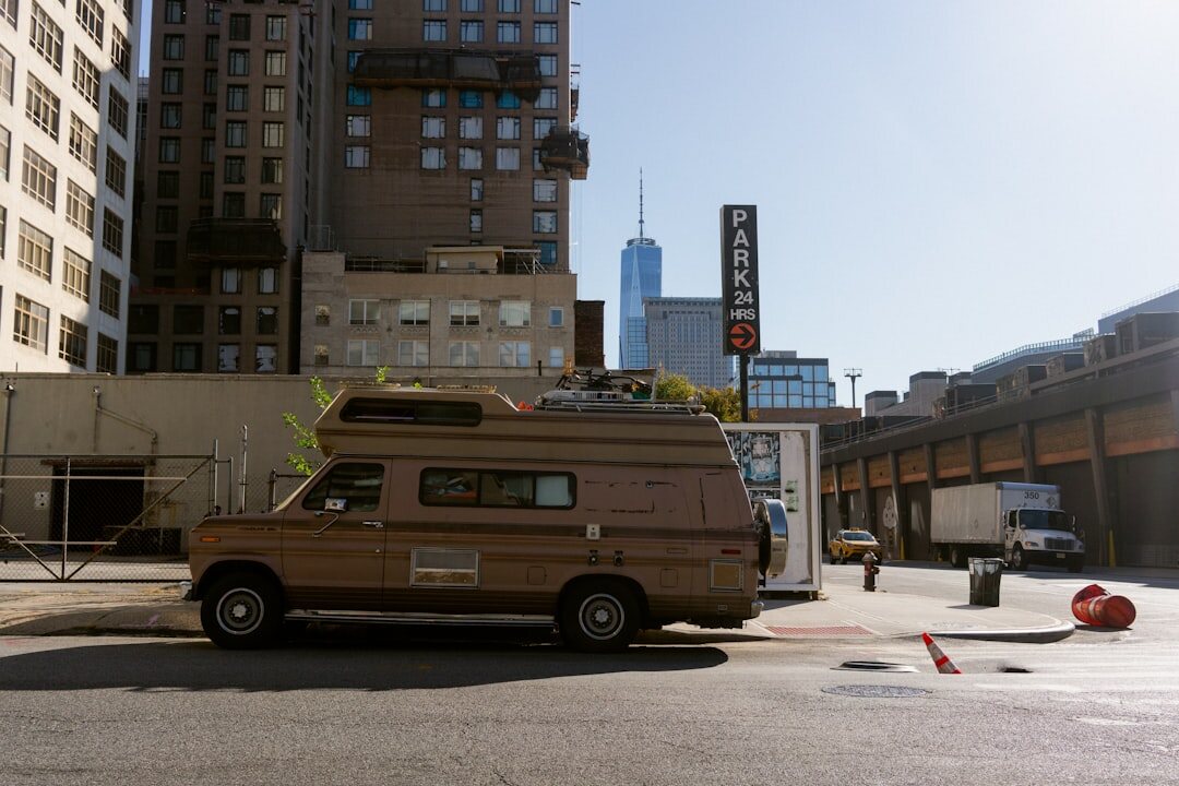 Outside broadcast van with satellite dish parked outside a venue