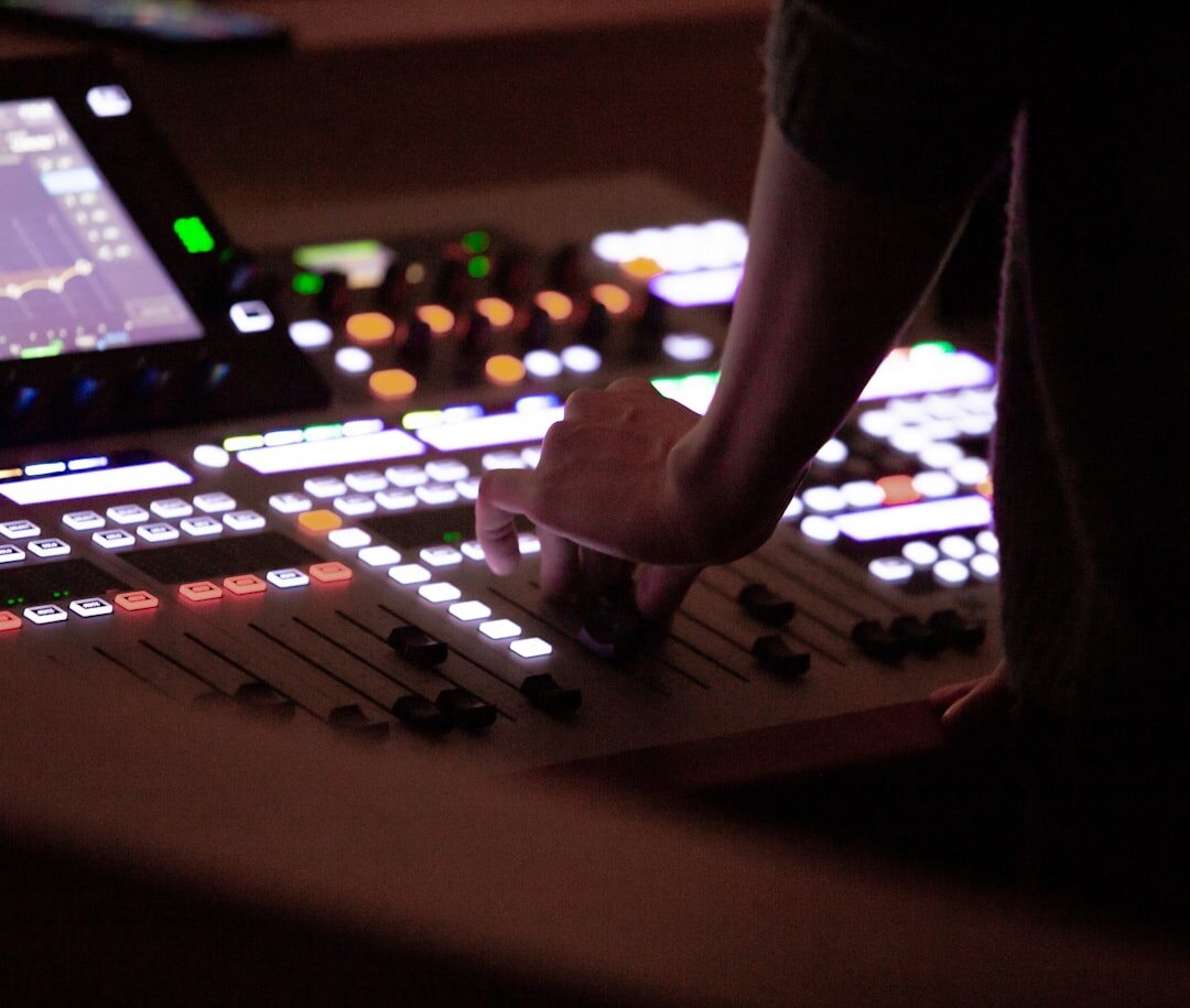 Production team coordinating a live show from a gallery control room
